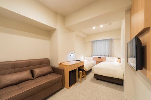TV a/nebo společenská místnost v ubytování Nesthotel alt Kuramae Station