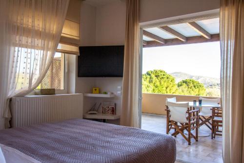A bed or beds in a room at Lida Garden Villa