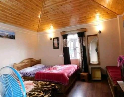 Postel nebo postele na pokoji v ubytování StayApart - Chiabari Homestay