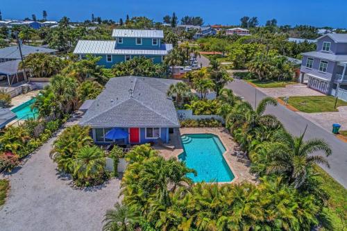 an aerial view of a house with a swimming pool at Salt Air East by Beach Retreats in Holmes Beach