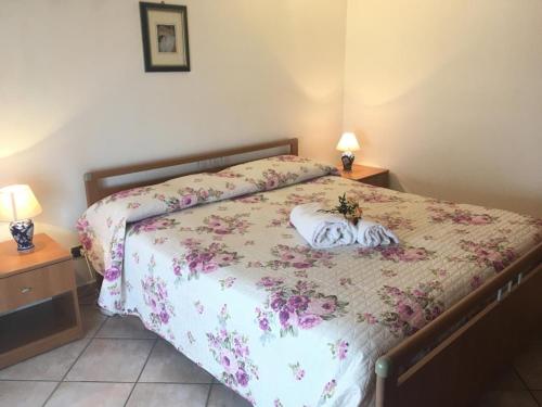 En eller flere senge i et værelse på Panorama sul Mare