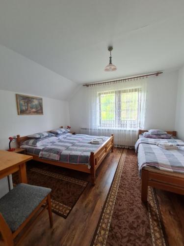 Posteľ alebo postele v izbe v ubytovaní Plitvice Rooms Family Glumac
