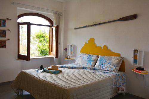 Кровать или кровати в номере B&B Lodge dell'Ospite Ischia