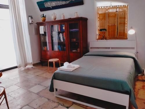 Postel nebo postele na pokoji v ubytování B&B Casa di Giò