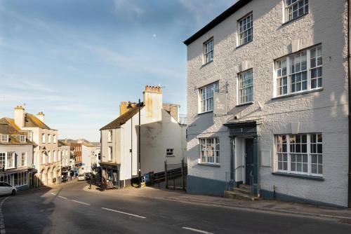 an empty street in a city with buildings at Lyme 1 Hotel in Lyme Regis