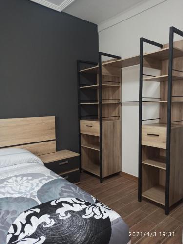 Postel nebo postele na pokoji v ubytování Apartamento reformado 2º