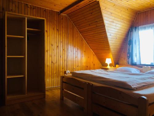 Postel nebo postele na pokoji v ubytování Domek w Górach