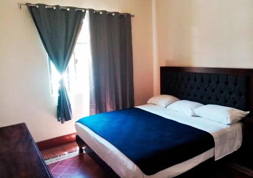 Katil atau katil-katil dalam bilik di Paulina Youth Hostel