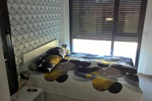 Postel nebo postele na pokoji v ubytování Sun Terrace Apartment