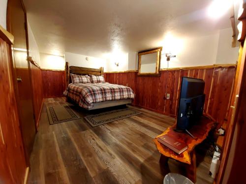 Log Cabin Innにあるベッド