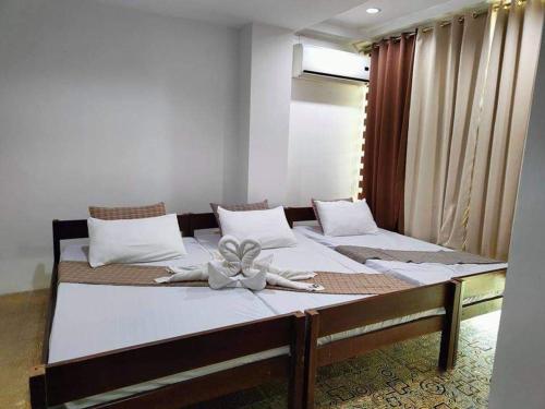 Krevet ili kreveti u jedinici u objektu RedDoorz @ Villa E Mansion