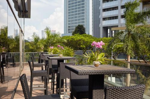 Un balcon sau o terasă la Pan Pacific Serviced Suites Orchard, Singapore