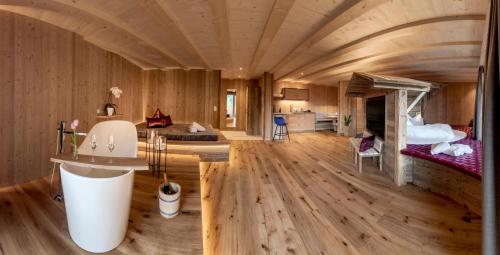 Ein Bett oder Betten in einem Zimmer der Unterkunft Mountain Village Hasenegg