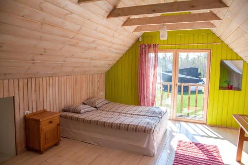 Postel nebo postele na pokoji v ubytování Kõveri Holiday Center