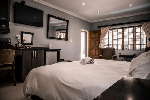 Katil atau katil-katil dalam bilik di Pinehaven Bed and Breakfast