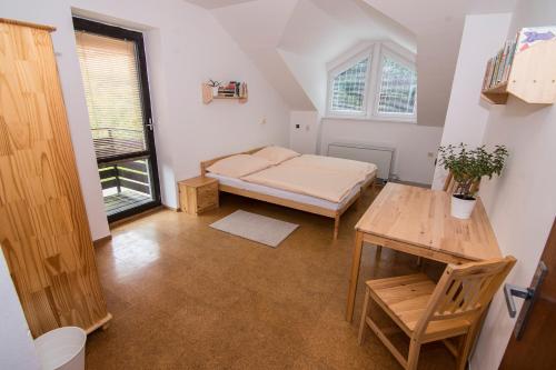 Postel nebo postele na pokoji v ubytování Apartmán Lorien Nekoř