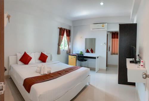 Voodi või voodid majutusasutuse Veva Residence Chiangmai toas