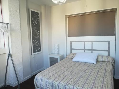En eller flere senger på et rom på Cumbre Loix Apartment