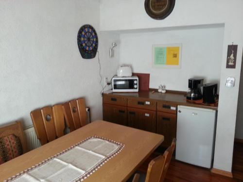 Kuchyň nebo kuchyňský kout v ubytování Gasthof Engel Steinbach