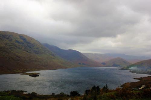 a view of a loch in the hills at Clifden Bay Lodge in Clifden