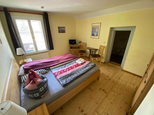 Letto o letti in una camera di Museumsherberge Glashütte