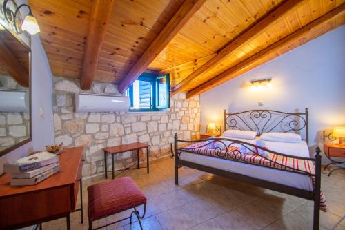 A bed or beds in a room at Ammos Zante Villas