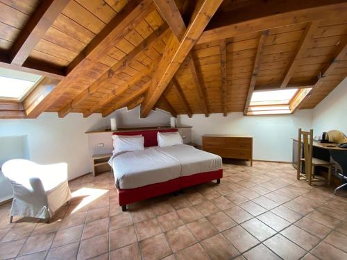 Postel nebo postele na pokoji v ubytování Hotel Lenno