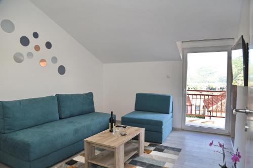 Зона вітальні в Apartmani Ateljević