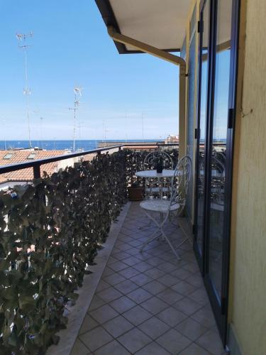 Un balcón o terraza de B&B CESARE'S Guests