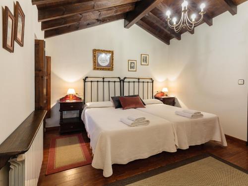 Cama o camas de una habitación en El Llagar de Naveda