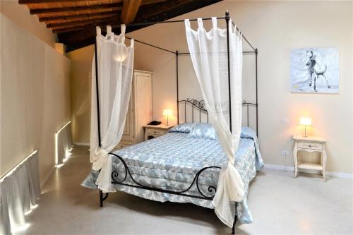 Letto o letti in una camera di Villa del Sole Siena