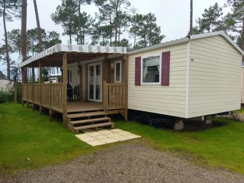 Bungalow de 3 chambres avec piscine partagee jardin amenage et wifi a Saint Julien en Born a 5 km de la plage photo