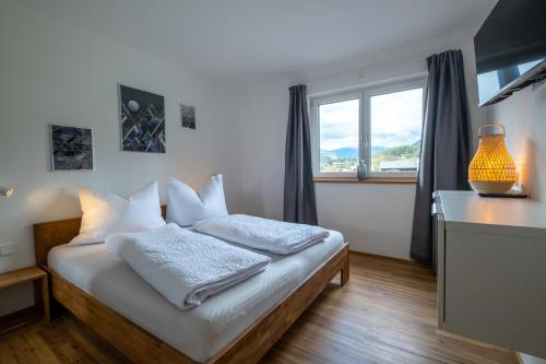 Posteľ alebo postele v izbe v ubytovaní Apartment Nora