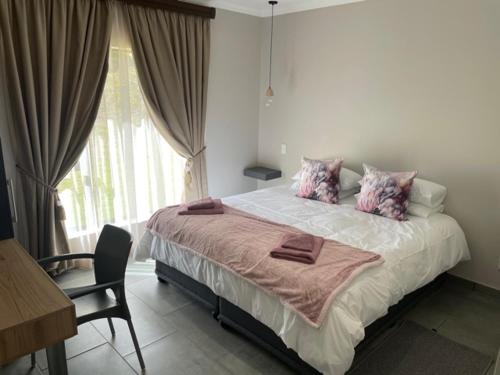 Postel nebo postele na pokoji v ubytování Cozy Corner