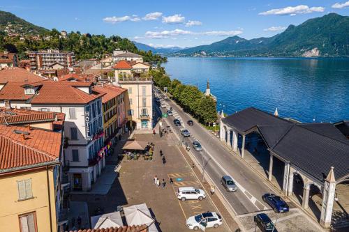 an aerial view of a town next to a body of water at Intra Hotel in Verbania
