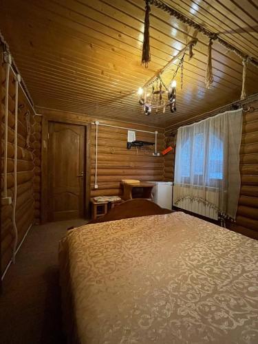 En eller flere senge i et værelse på Садиба у Попа