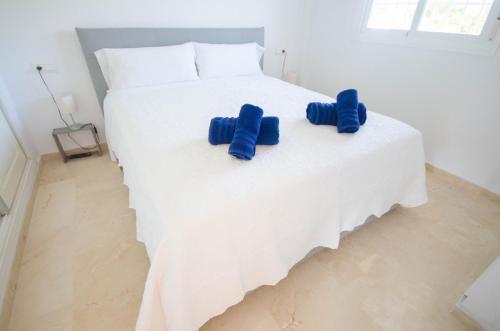 Кровать или кровати в номере Apartamento Marina Casares