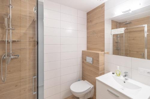 Ванна кімната в Apartamenty Proeko Polonia