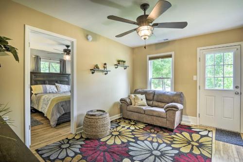 a bedroom with a bed and a ceiling fan at Lakefront High Point House with Furnished Deck! in High Point