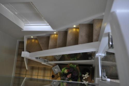 a view from the top of a room with stairs at The Westbourne in Bowness-on-Windermere