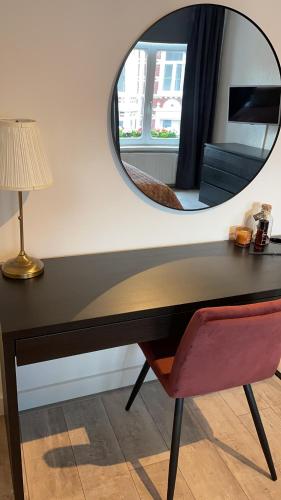 TV a/nebo společenská místnost v ubytování BnB Bruxelles - Studios & Apartments