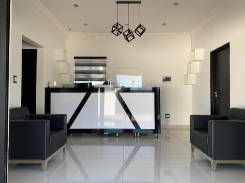 Ruang duduk di Thamani Guest House