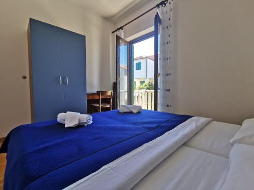 Llit o llits en una habitació de Villa Ela