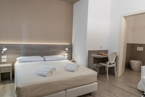 Postel nebo postele na pokoji v ubytování Dolce Notte