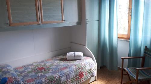 Katil atau katil-katil dalam bilik di Alloggio Turistico IL Bucchero