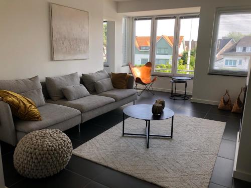 Istumisnurk majutusasutuses Sfeervol appartement te Blankenberge