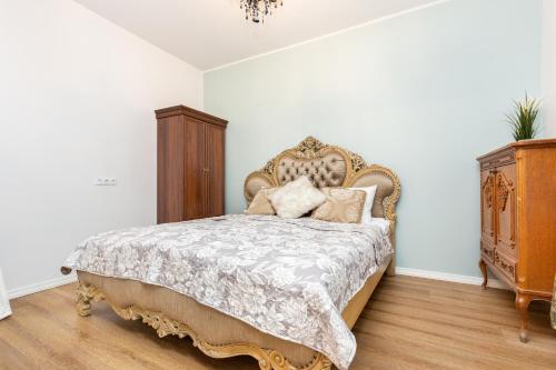 Ένα ή περισσότερα κρεβάτια σε δωμάτιο στο EasyRentals Central Tallinn Apartments by Tallinn University