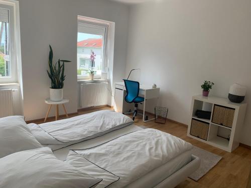 מיטה או מיטות בחדר ב-Wohnen am Berg