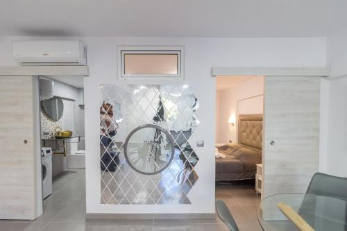 a living room with a bike on the wall at Holiday Home Alexia Oceanfront in San Bartolomé de Tirajana