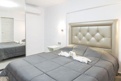 Кровать или кровати в номере Holiday Home Alexia Oceanfront